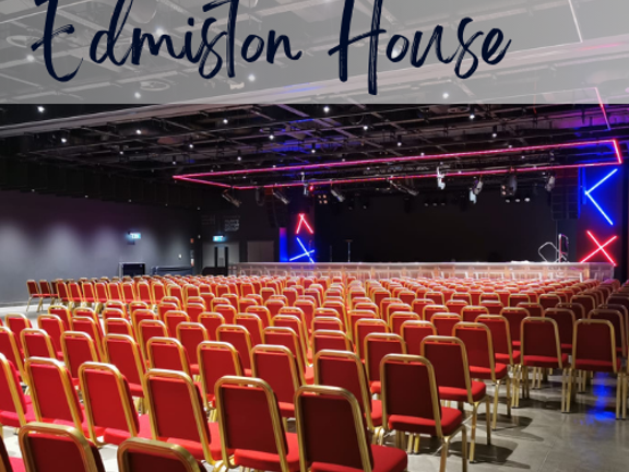 Meeting room set up theatre style with red chairs, red and blue neon lights on the stage. Text across the top of images reads Edmiston House.