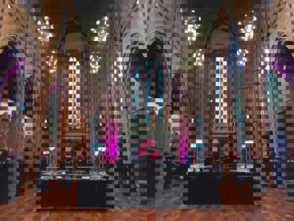 Gothic style Grand Hall at The Barony set up for a buffet station in the middle of the room.