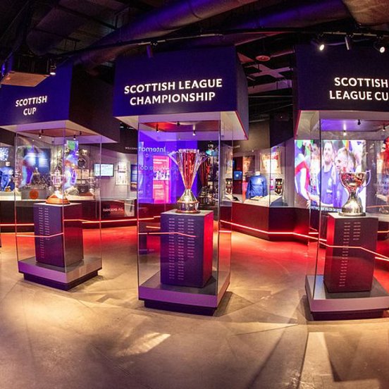 Football museum cabinets displaying trophies at Ibrox Stadium 