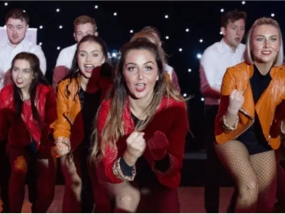 Group of entertainers dancing
