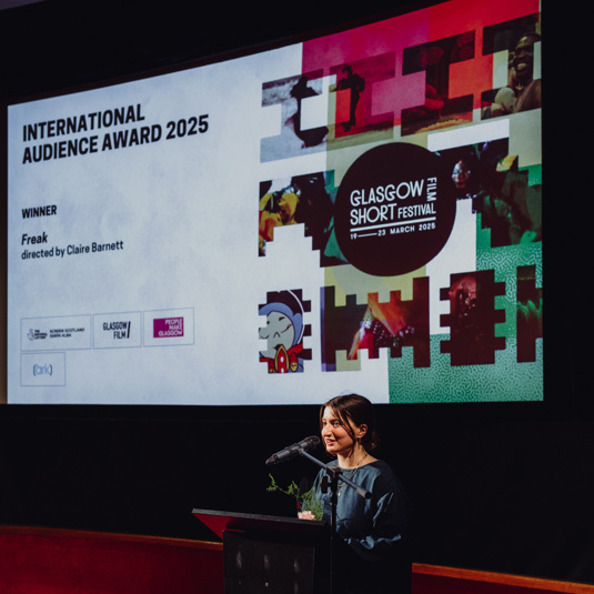 The Winner Claire Barnett collecting her award