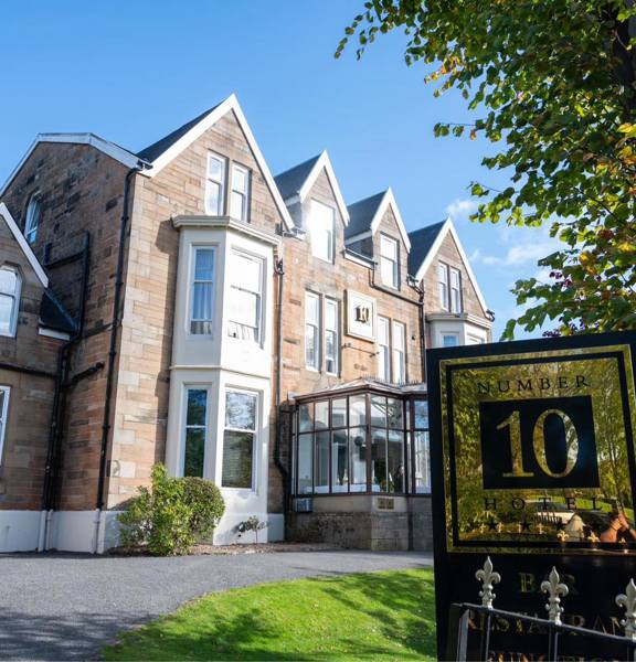 Victorian blond sandstone façade of Number 10 Hotel in Glasgow.