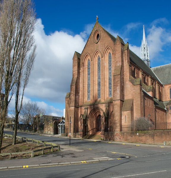 Red sandstone gothic style building known as The Barony.