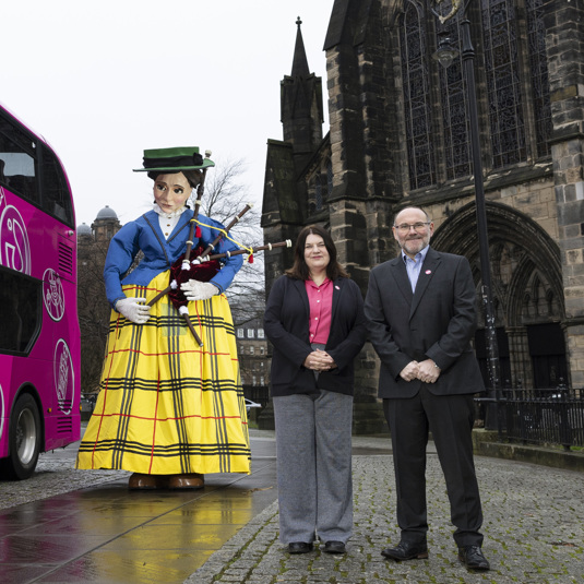 Leader of the Council, Councillor Susan Aitken, Graeme Macfarlan, First Bus Scotland Commercial Director, Bessy the Bagpiper