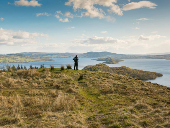 Hiker looking over Loch Lomond