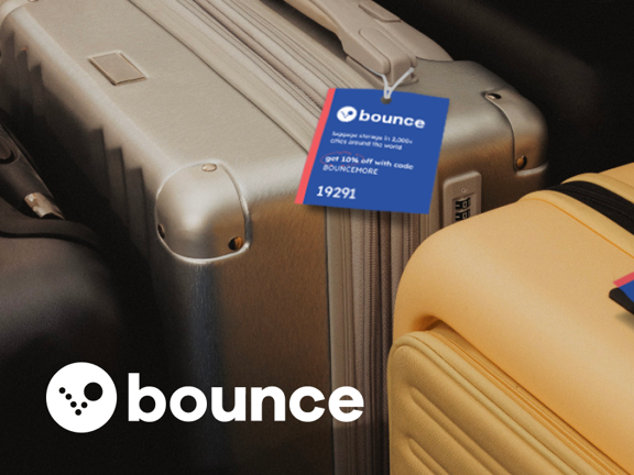 Two suitcases with Bounce luggage tags on them