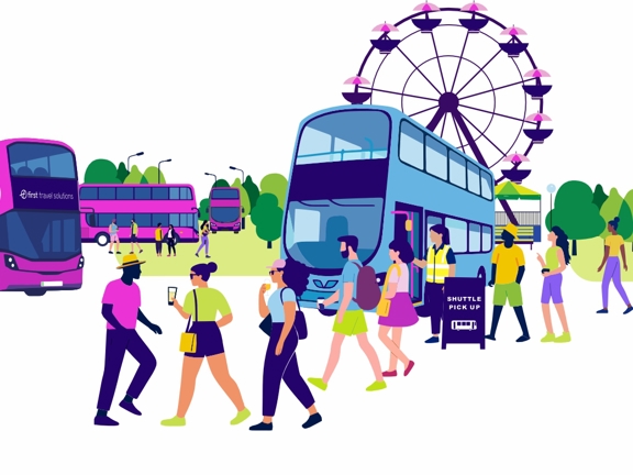 People at a festival buses wait at a shuttle pick up point.