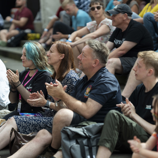 Group of people enjoying the festival and outdoor space 