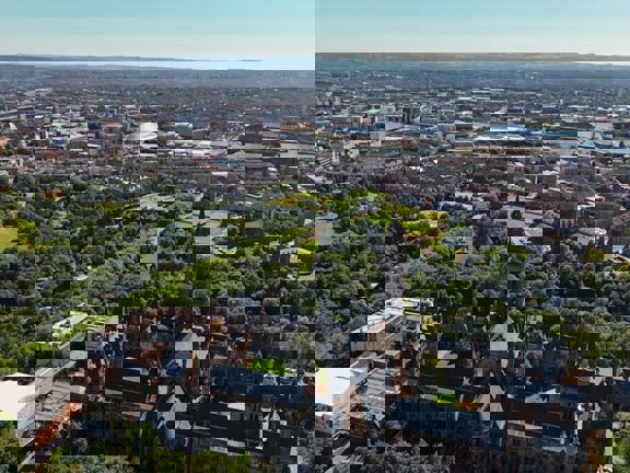 Ariel shit of Glasgow looking south from University of Glasgow and Kelvingrove across the city to SEC and beyond.