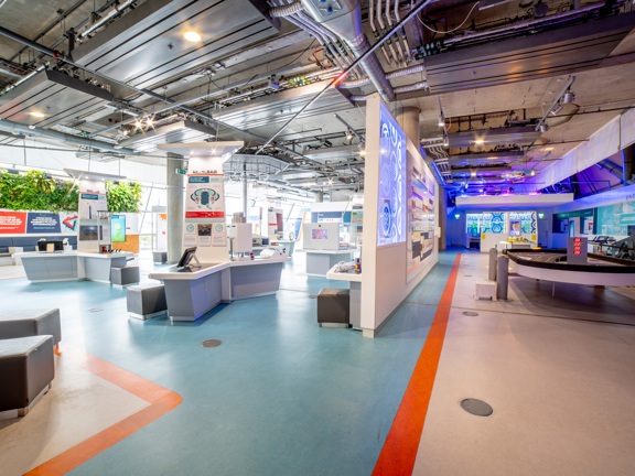 Large bright open space with interactive science exhibition displays