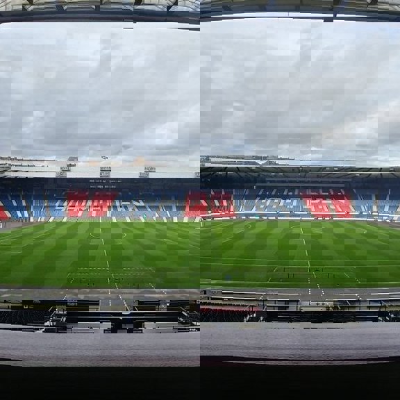 A view of Hampden stadium from the empty stands with the word HAMPDEN spelt out in the chairs in white