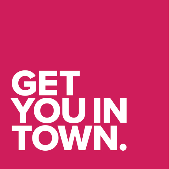 White writing on a pick background that reads Get You In Town