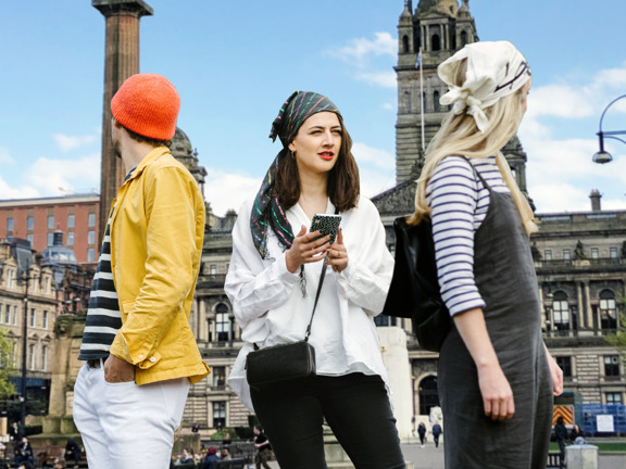 Three people on a treasure hunt in Glasgow