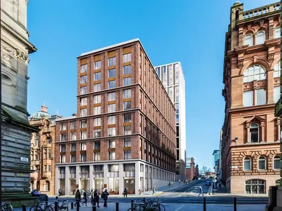 Image shows a digital render of the external view of the AC by Marriott Hotel. A multi-storey stone and brick building on a sunny day..