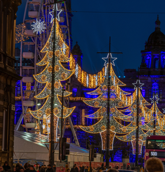 Christmas Lights Display at George Square of 5 Christmas tree lights in blue and yellow