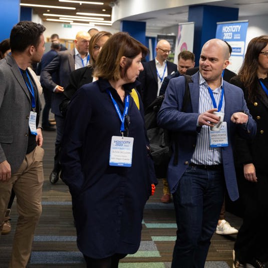 Delegates in discussion in a room