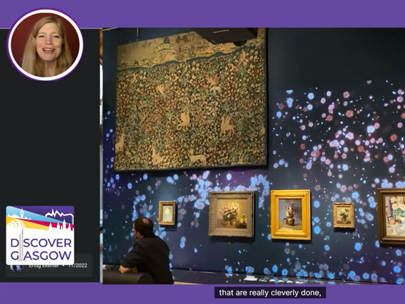 Screenshot of a virtual tours with a picture of the presenters head on the to left of the image. Disciver Glasgow Logo to hte bottom left and the main images is of the inside of The Burrell Collection (a museum in Glasgow) displaying some art. Captions along the bottom read: they are really cleverly done. 