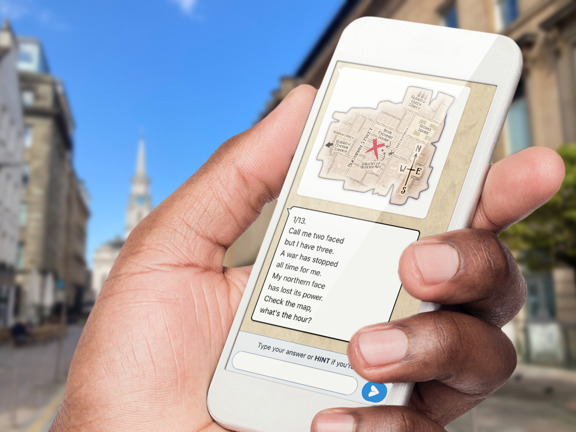A hand holding a mobile phone with a map and questions displayed on it. 